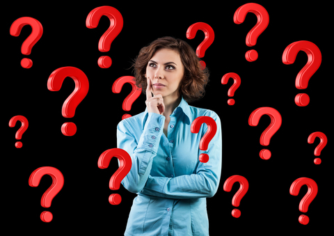 http://www.dreamstime.com/royalty-free-stock-photography-beautiful-girl-standing-many-red-questions-image29878897