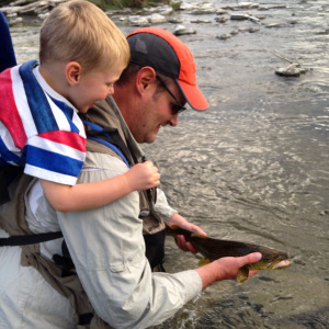 Dad and Benny admire a nice brown trout. 