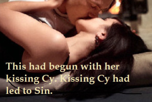 Young couple kissing by fireplace --- Image by © Mika/Corbis