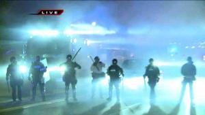 police quashing protests at Ferguson, Missouri