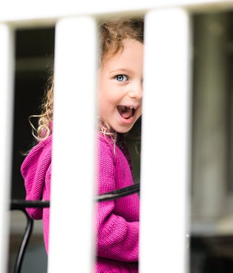 4½-Year-Old Claire caught through a railing -- Grandma and Grandpa's -- Rootstown, Ohio, USA -- Copyright 2014 Jeffrey Friedl, http://regex.info/blog/