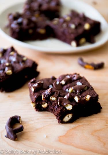 The fudgiest homemade brownies are so easy to make! Stuffed with chocolate covered pretzels and chocolate chips. 