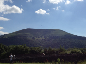 View from Abergavenny Castle. Can you see the people paragliding? 