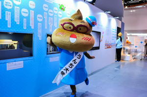 Who wants to hug Poopy, the exhibition mascot?