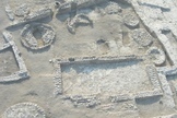 The courtyard building found at the Tel Tsaf archaeological site, with one of the silos, where a 40-year-old woman was buried inside a grave (upper left corner).