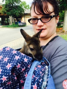 Mother is holding some sort of foreign creature here. 