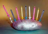 This photo is not mine, but this is including the birthday candles--sans the gold paint--what our menorah looked like.