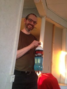 ...and Andreas evilly tried to poison everyone with windshield washer fluid in a Coke bottle...