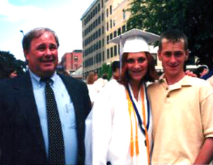 At graduation with dad & bro.