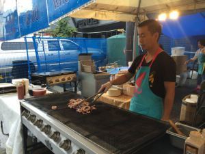 Manning the squid grill.