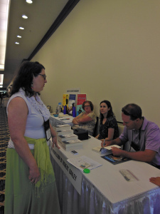 Signing a book for Jennifer Precise.