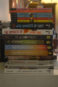 A stack of Carrie Mac's books.