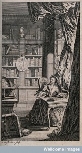 V0040734 A woman is sitting at a desk in a library, writing a letter.