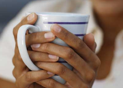 hands and coffee