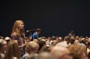 Festival attendee Hanna Fisher of Fairfax, Va., asks a question of Fiction and Mystery author Ismael Beah. Photo by David Rice