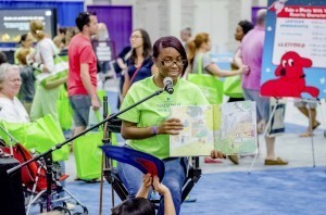 Evangeline Mackey, Library staff, reads to children at the 2014 National Book Festival. Photo by Ralphael Small 