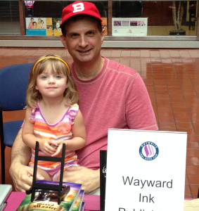 Helping Papa sell some books