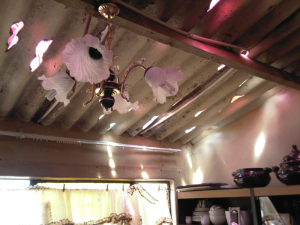 Christina Mothapo's house on the inside, in the sitting room where we normally hold services, showing the holes in the roof