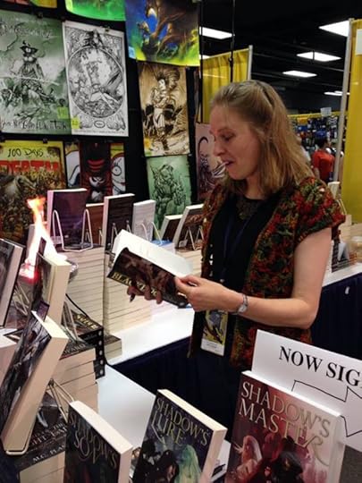 Signing books at the Pyr Booth at DragonCon 2014. All photos in this post are by Lou Anders - the silly expression is his fault.