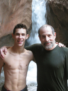 Daniel Asa Rose (left), with his son, rafting down the Grand Canyon. Photo courtesy of Daniel Asa Rose.