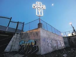 red devil statue, East Van, Christian symbolism