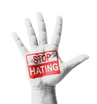 Open hand raised, Stop Hating sign painted, multi purpose concep