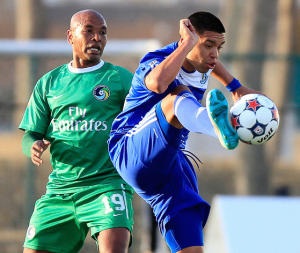 New York's Marcos Senna watches as FCE's Milton Blanco gets a foot to the ball in action from earlier in 2014. PHOTO FC EDMONTON/TONY LEWIS