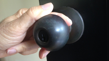 fingers-on-doorknob 450