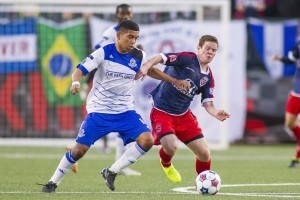FCE's Milton Blanco, left, battles for the ball with Indy's Mike Ambersley.