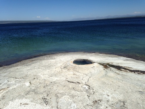 I believe this is Big Cone, unless it is Fishing Cone. It's a geyser right at the edge of a vast, icy lake. I'm mad for this picture for some reason.