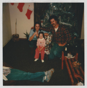 My parents and me, their first Christmas married when I was 2. Dad's ALS was related to his time serving in the Army in the 70s. We had no idea back then what he would go through.