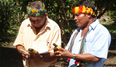 Achuar community monitors learning to use GPS