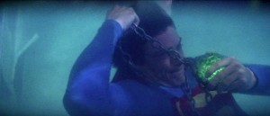 Superman wrestles with Kryptonite 