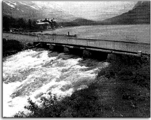 Swiftcurrent Bridge, which provides access to Many Glacier Hotel, was losing its structural integrity, had a cracked deck, and could no longer handle high water. - NPS photo from the park planning document