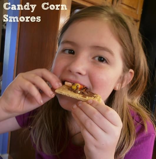 Make S'mores with candy corn and candy corn marshmallows.