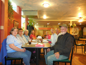 Clockwise from left: Diane, Janet, Jenny, Gillette, Mom, Michael, Tim and George