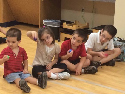 Random picture of my kids at a recent Down syndrome group event--a music therapy night