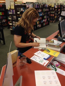 [9/16: Me signing my first books in public at the Goodyear, Arizona, Barnes & Noble]