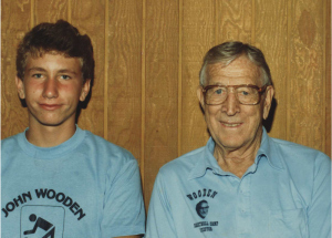 Patrick Jones with John Wooden at basketball camp, 1985