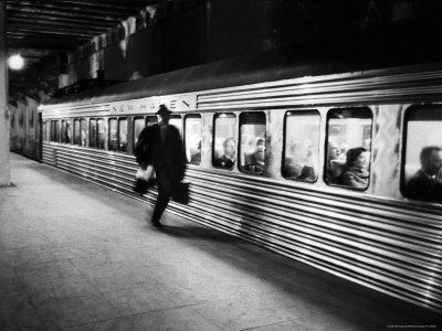 alfred-eisenstaedt-commuter-on-the-new-york-new-haven-line-running-to-catch-train-pulling-out-of-grand-central-station-1.jpg