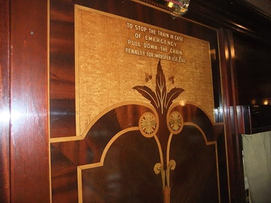 The marquetry. Oh, the marquetry. And an instruction about what to do in case of an unexpected emergency...