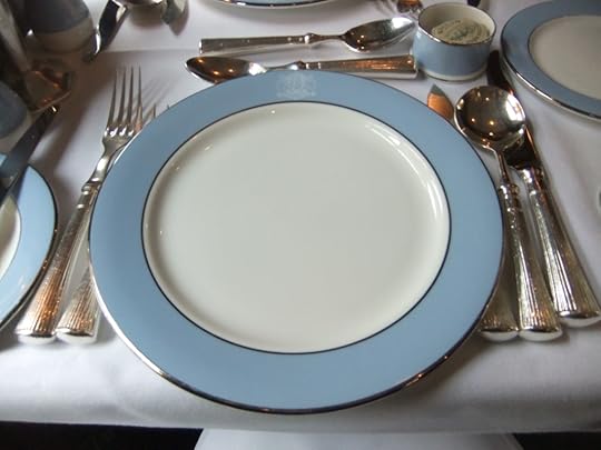 The beautiful place setting. The crest was always at the top, and the knives and forks and crystal glasses were ALWAYS rattling as the train moved. Pouring a drink was a difficult activity!