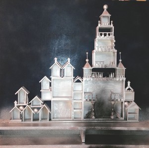 Step 10: Put it all together. (That black blotch is not a lighting problem, it's where the crypt exploded and took out the bottom stories of the church.) Next steps: paint, paper, pictures, junk stuff, STORY.