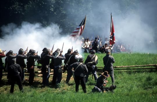 Confederate soldiers advance Civil War battle reenactment