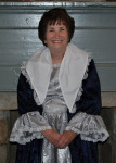 In Martha Washington gown