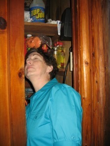 Woamn with closed eyes in closet