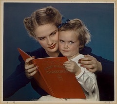 Mother reading story to child