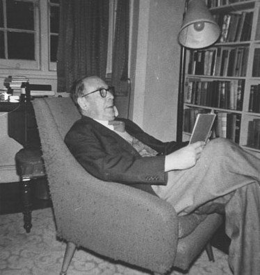 CSL reading in chair