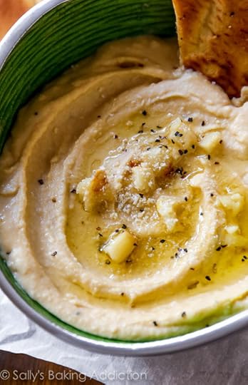 Roasted Garlic Parmesan Hummus Recipe - smooth as silk and served up with homemade pita chips