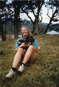 With a chimpanzee in Zaire, the afternoon after coming back from a trek to see gorillas in the wild. Happy times.